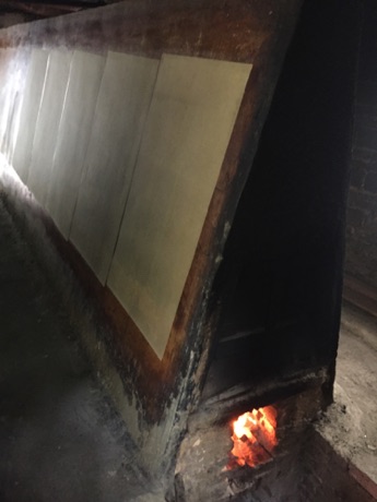 Paper Making: Drying the paper 
over a charcoal kiln: Tantau